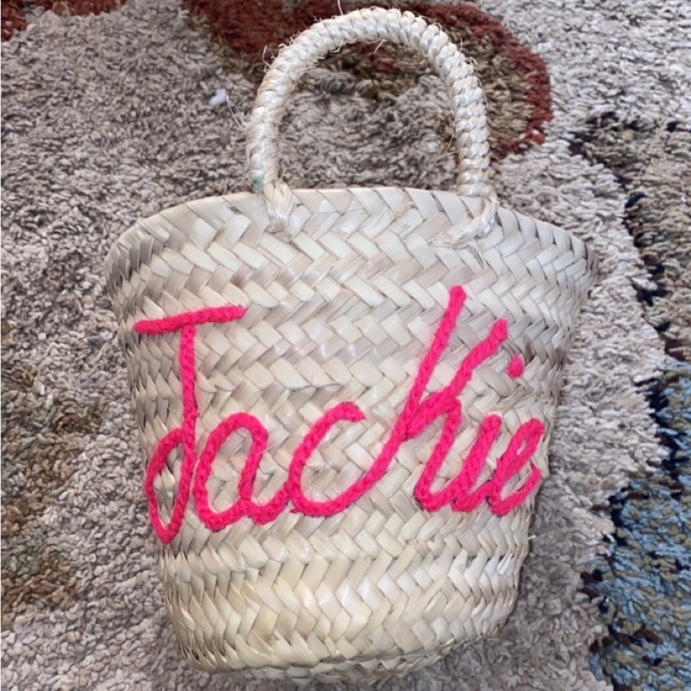 A beautiful handmade monogrammed straw bag from etsy never used before.